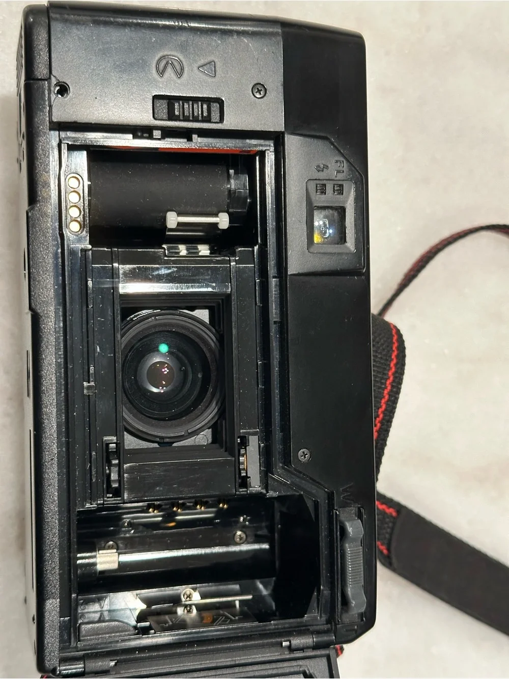 Pentax Black Point-and-Shoot Film Camera with Red-Trim Strap